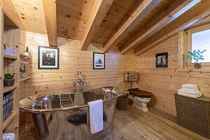 Bathroom with copper bath