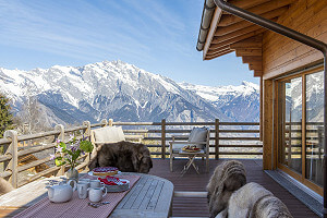 Tea on the terrace with mountains in the distance